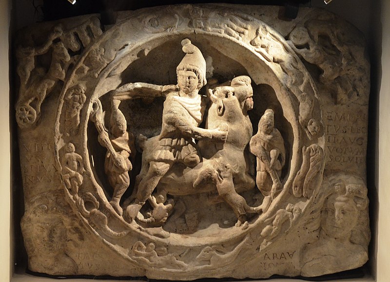 a stone statue of a person