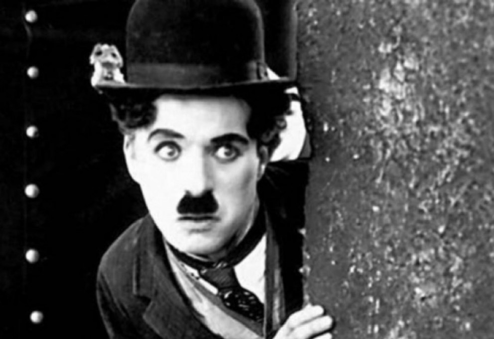 charlie-chaplin Charlie Chaplin wearing a hat