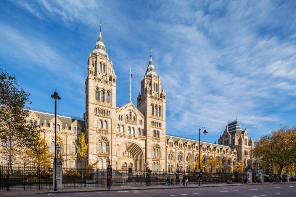 a close up of a church with Natural History Museum in the background