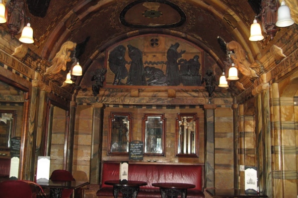 a room filled with furniture and a large window