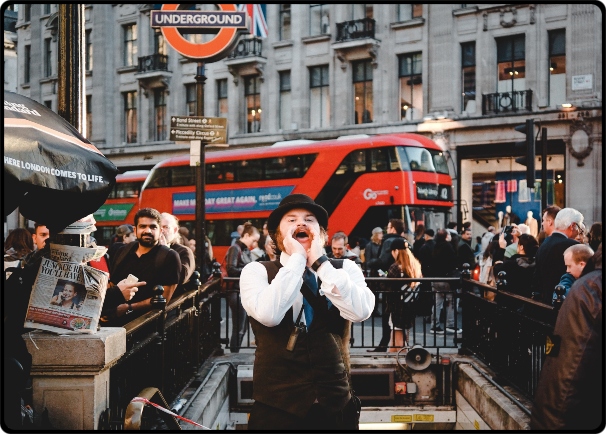 abi-ismail-fzpsFoatUUo-unsplash (1) a group of people riding on the back of a truck