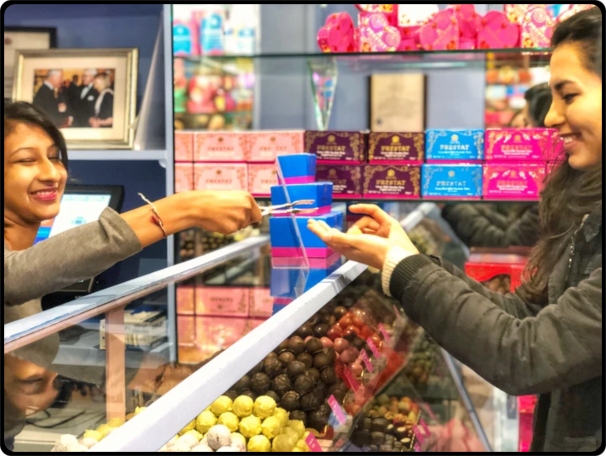 a person standing in front of a store