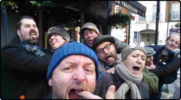a group of people posing for the camera